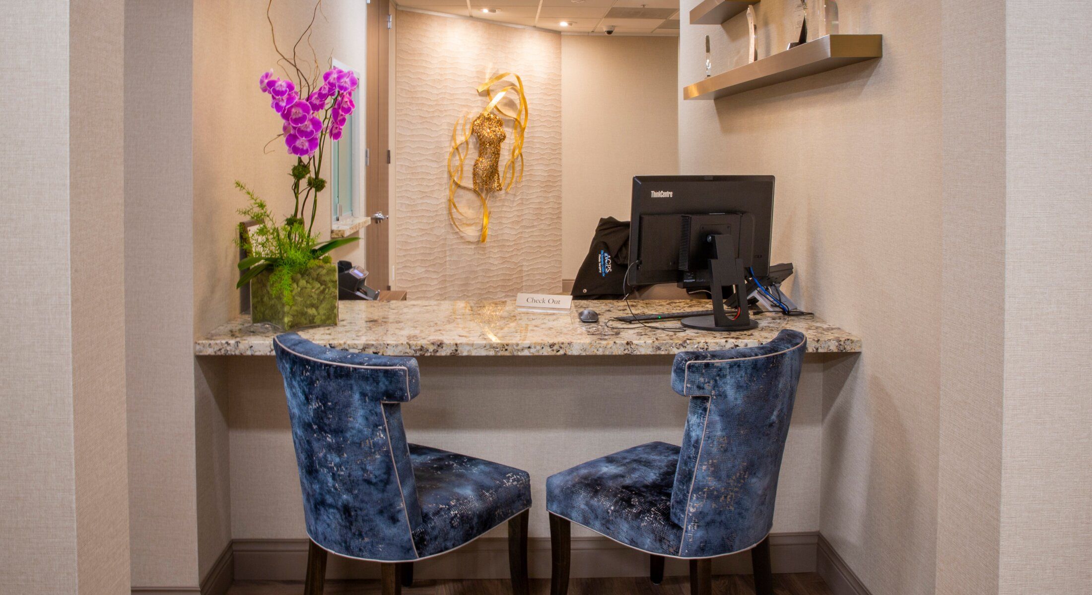 Modern reception area with stylish chairs and decor.